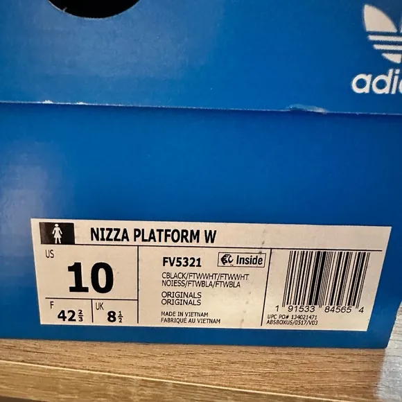 Adidas Black and White nizza platform women’s shoes.  Size 10. New in box.