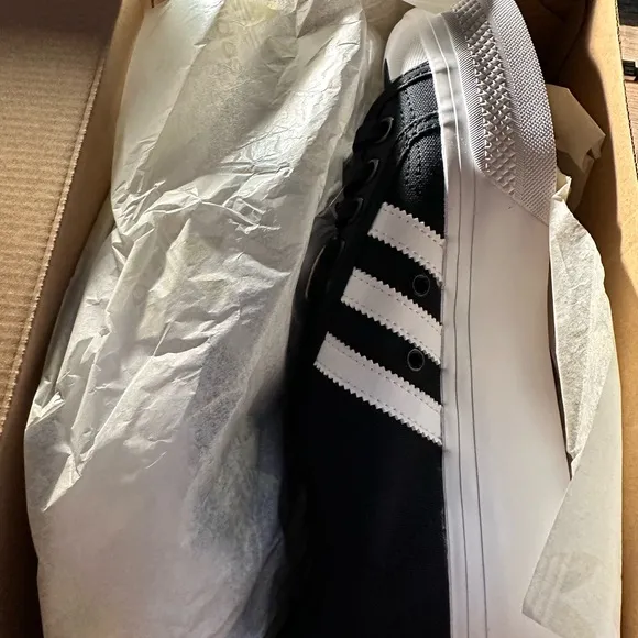 Adidas Black and White nizza platform women’s shoes.  Size 10. New in box.
