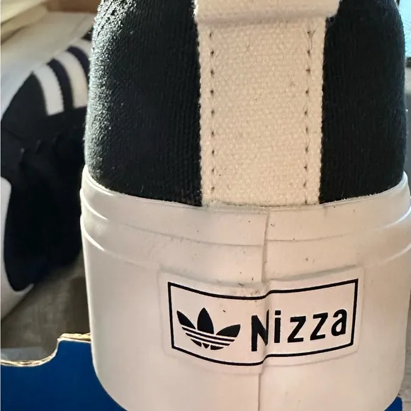 Adidas Black and White nizza platform women’s shoes.  Size 10. New in box.