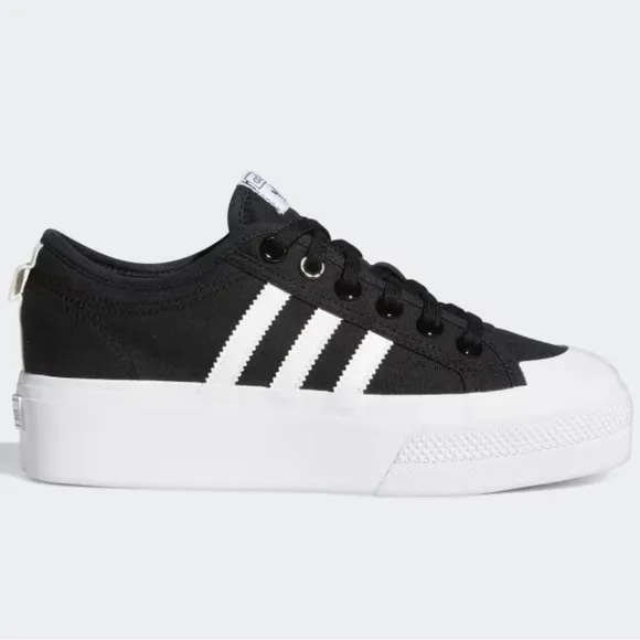 Adidas Black and White nizza platform women’s shoes.  Size 10. New in box.
