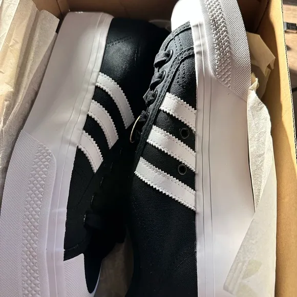 Adidas Black and White nizza platform women’s shoes.  Size 10. New in box.