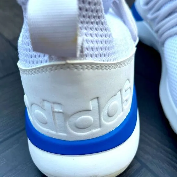 Adidas white/blue trim slip-on tennis shoes. Logo, mesh body, mock laces,13