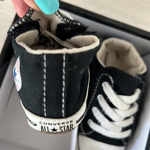 Adorable white and black Baby Converse Chuck Taylor All Star Cribster Sneakers