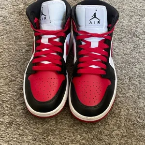 Air Jordan Red and Black High-Top Sneakers