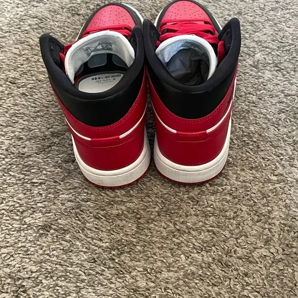 Air Jordan Red and Black High-Top Sneakers