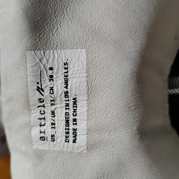 Article No. designed in Los Angeles black and white hi top shoes size 12