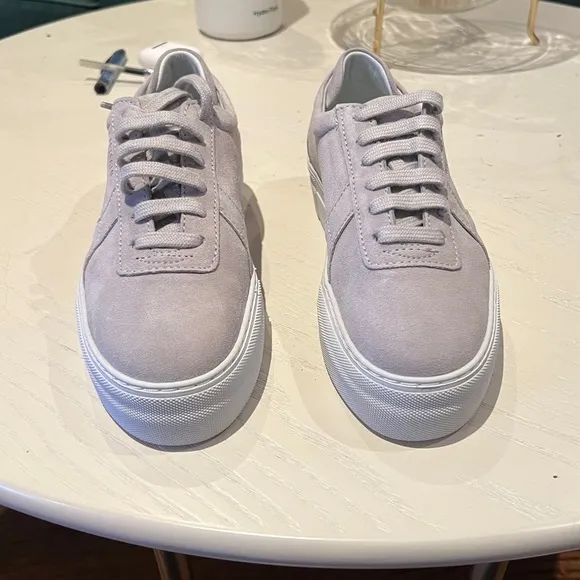 Axel Arigato platform low-top suede sneakers