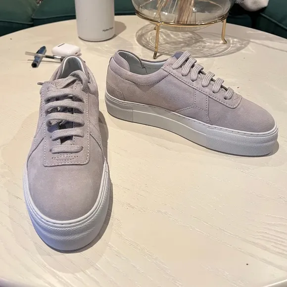Axel Arigato platform low-top suede sneakers