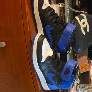 Black and Blue High-Top Sneakers with Glossy Finish