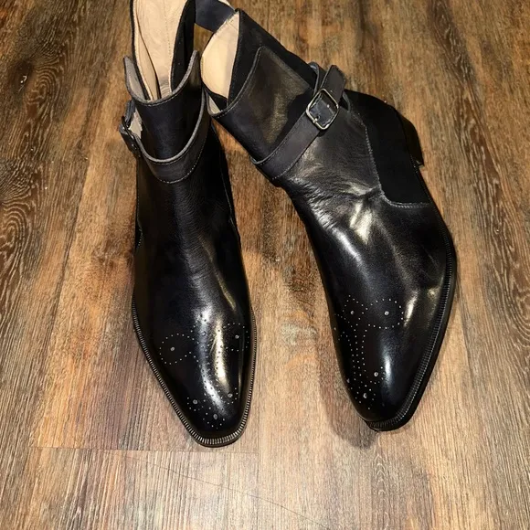 Black brogue strapped boots