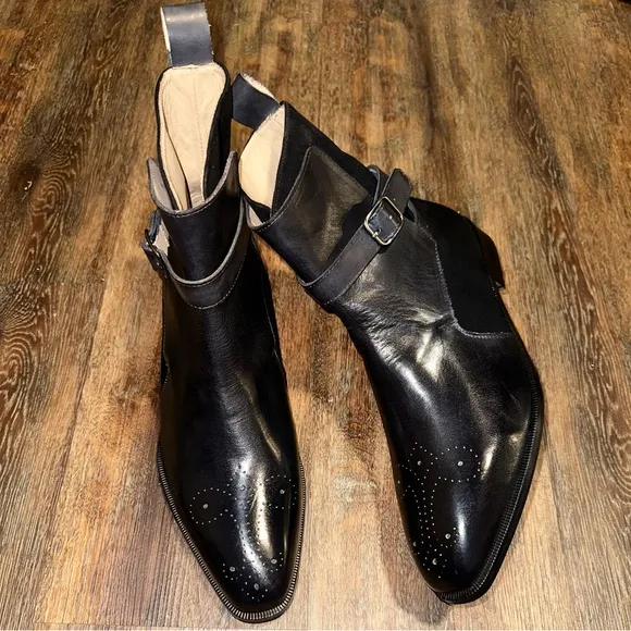 Black brogue strapped boots