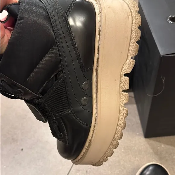 Black High-Top Sneakers with Beige Soles