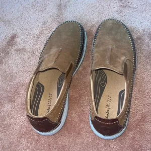 Clarks NWOT Men’s  Brown Slip-On Shoes