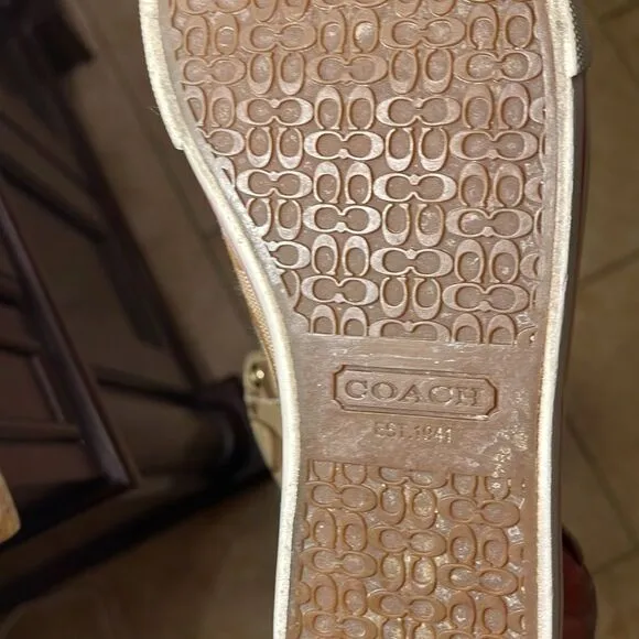 Coach pink high top reversible sneakers.