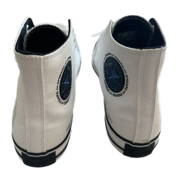 Converse high top white sneakers