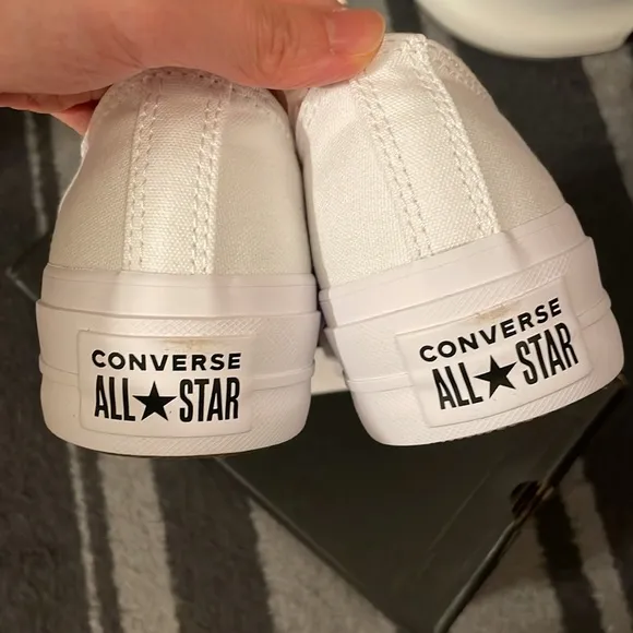 Converse Taylor All Star White Platform Sneakers with pink shoelaces