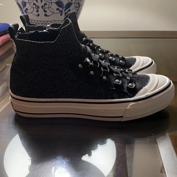DKNY Sheila Lace Up Hig- High Top Sneakers.