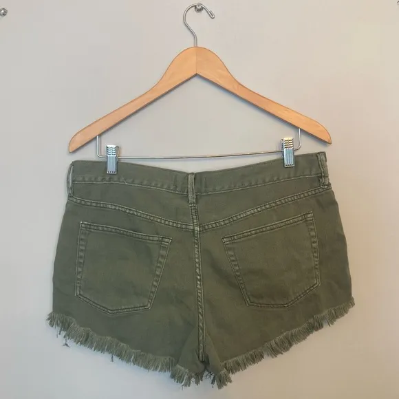 Free People Loving Good Vibrations Distressed Denim Shorts in Sage