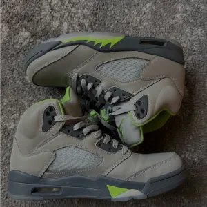 Gray and Green High-Top Jordan 5s green beam