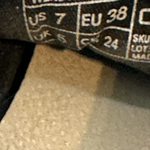Hey Dude Black and White Sneakers with Slip-On Style