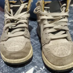 High-Top Sneakers in Beige and Black