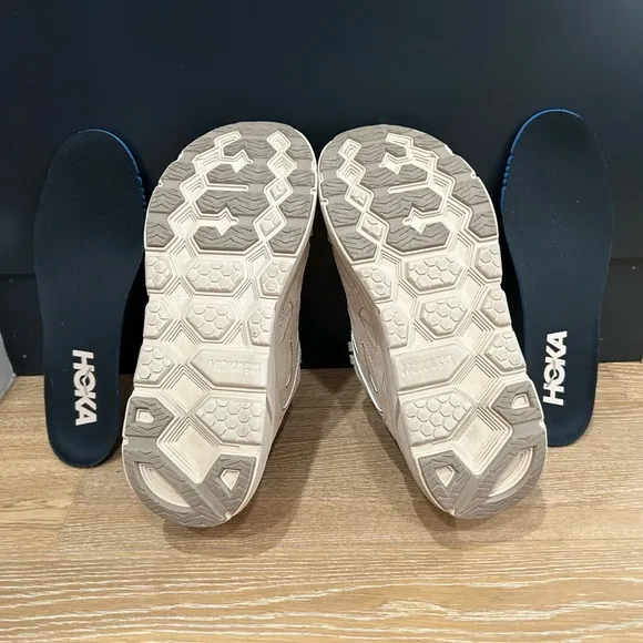 HOKA One One Clifton Suede size 9.5 women’s and 8.5 men’s.
