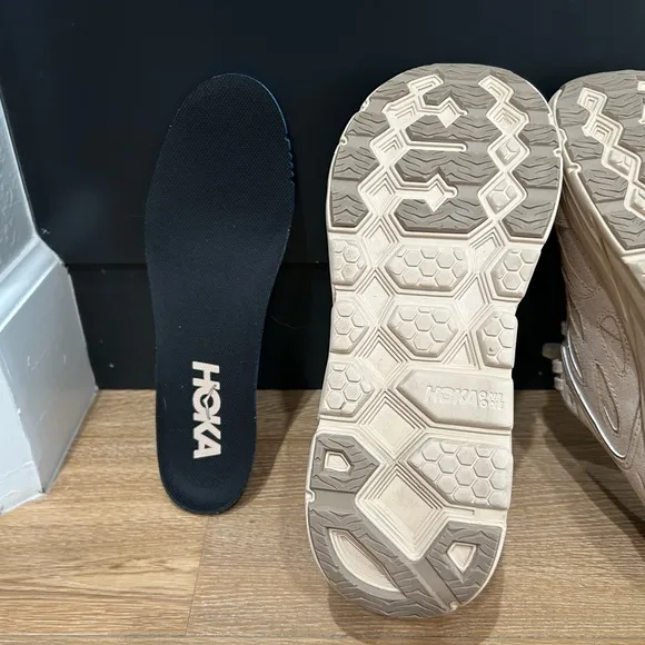 HOKA One One Clifton Suede size 9.5 women’s and 8.5 men’s.