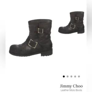 Jimmy Choo, black with a silver shimmer leather combat boots