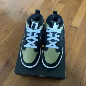 Jordan 1 Mid- Black and Green kids sneakers