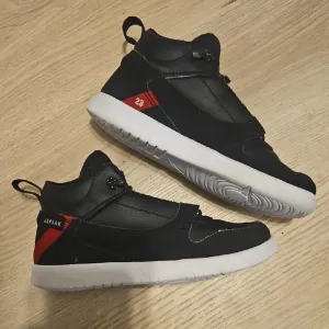 Jordan Black and Red High-Top Sneakers with Ankle Strap