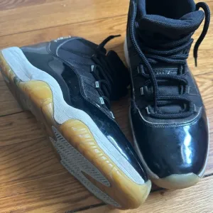 Jordan’s 11 Black High-Top Sneakers