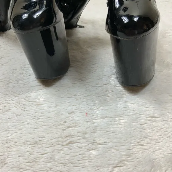 Lace up patent leather heel lace up boots
