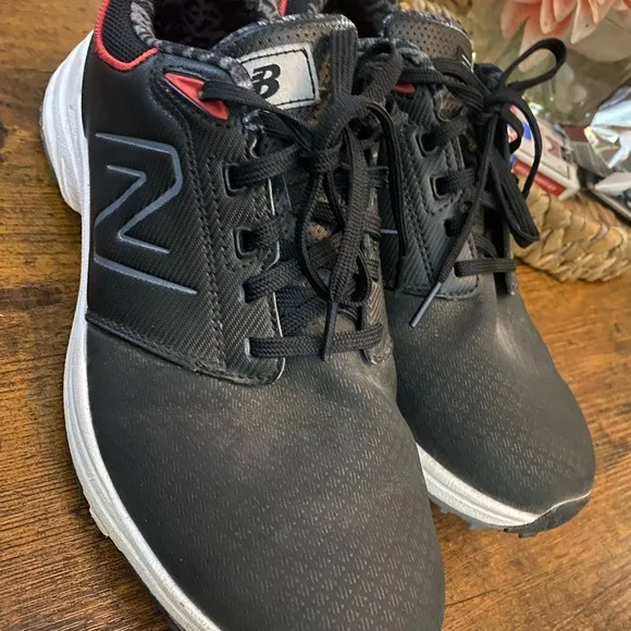 New Balance Black and White Athletic Shoes for men’s size (9.5)