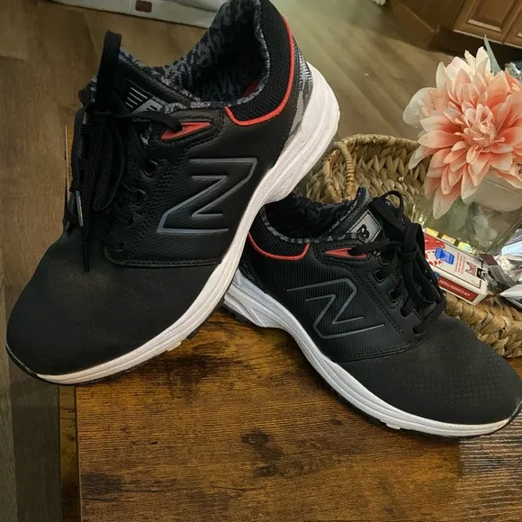 New Balance Black and White Athletic Shoes for men’s size (9.5)