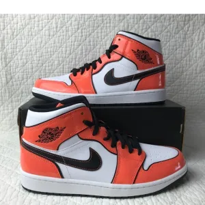 Nike Air Jordan High-Top Sneakers in Orange and White Tuft Toe
