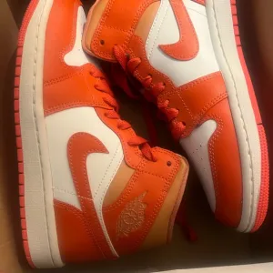 Nike Air Jordan High-Top Sneakers in Orange and White