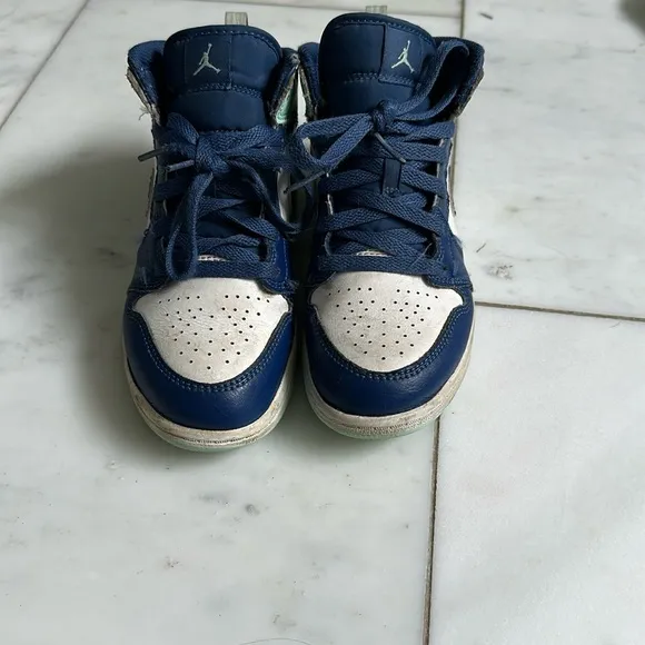 Nike Air Jordan’s Blue, Teal and White High-Top Sneakers