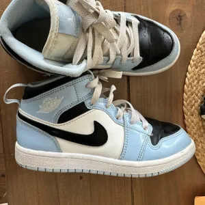 Nike Black and Blue High-Top Sneakers
