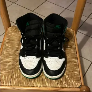 Nike Black and White Sneakers with Green Highlights