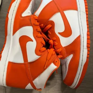 Nike Dunk Orange and White High-Top Sneakers