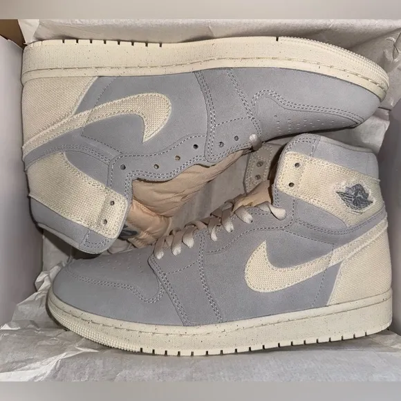 Nike Gray and Cream High-Top Sneakers with Iconic Design