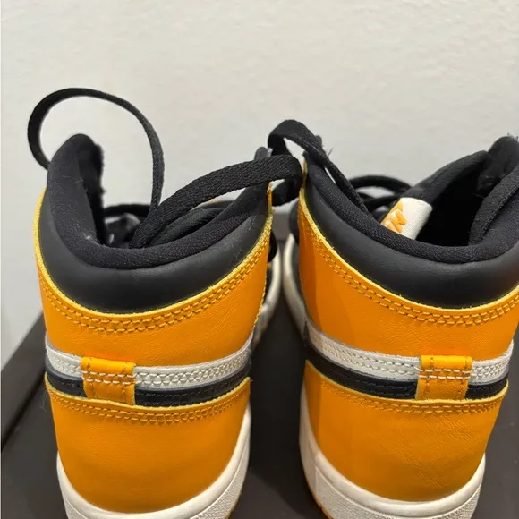 Nike High-Top Sneakers in Black, White, and Orange