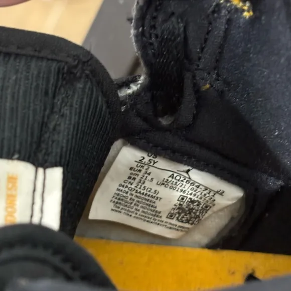 Nike High-Top Sneakers in Black, White, and Orange