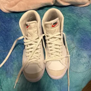 Nike High-Top Sneakers in Cream