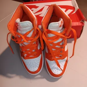 Nike High-Top Sneakers in Orange and White