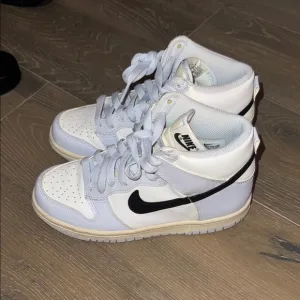Nike High-Top Sneakers in White and Black
