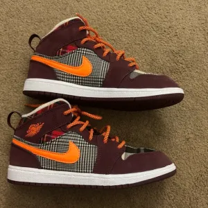 Nike High-Top Sneakers with Orange Accents