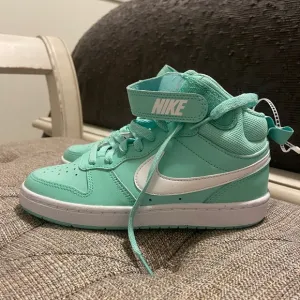 Nike Mint Green High-Top Sneakers