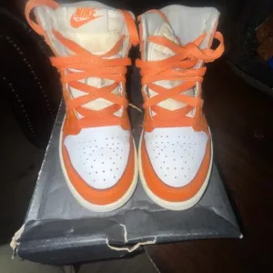 Nike Orange and White High-Top Sneakers