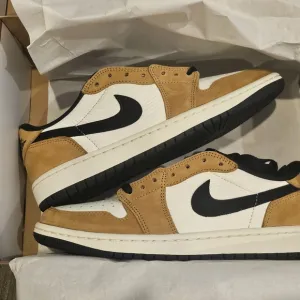 Nike Tan and Black High-Top Sneakers
